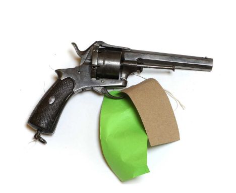 A six shot pin fire revolver Spanish, 19th centurythe brass frame chequered walnut butt11cm barrelProvenance : from the estat