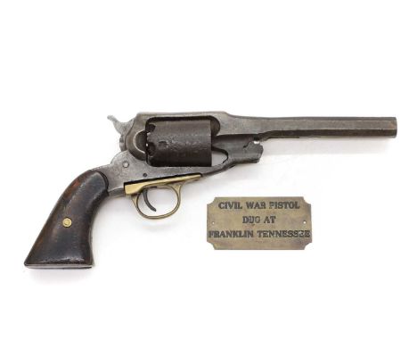 An American Civil War Pistol from the Battle of Franklin with plaque reading "Civil War pistol dug at Franklin, Tennessee"In 