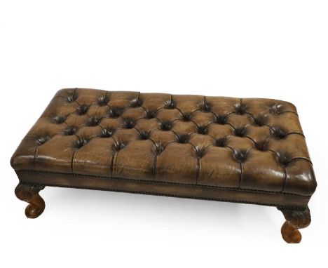 A pair of leather stools, 20th century, each with button-backed leather seats, 97cm wide47cm deep28.5cm high (2)Condition Rep
