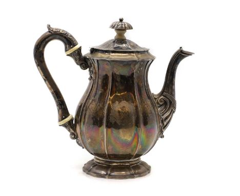 A George IV silver coffee pot  by WE, London 1826, with ivory insulators and a lobed body, 22.5cm high 32oztIMPORTANT NOTEThi