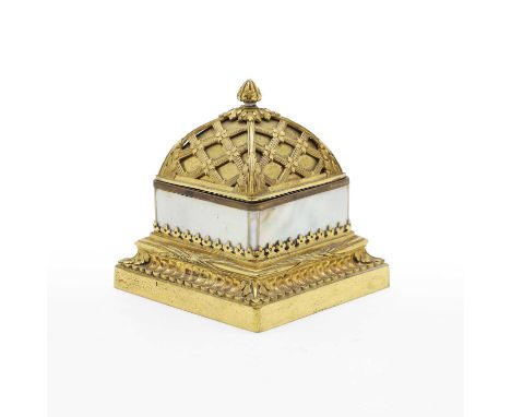 A bronze and mother of pearl mounted inkwell 19th century, the domed top revealing an internal glass inkwell,9.6cm highCondit