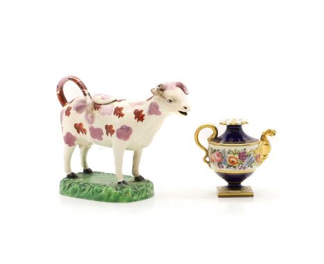 A Staffordshire cow creamer early 19th century, with pink lustre spotted decoration,cm highand a Flight Barr &amp; Barr Worce