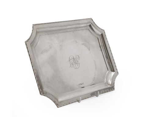 A silver dish, by Walker and Hall, Sheffield 1919, of rectangular form with re-entrant corners, mongrammed, 30.5 x 22.5cm, 14