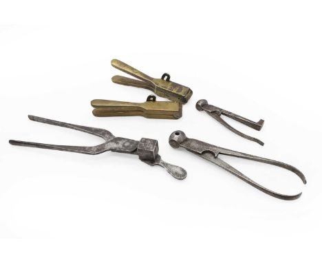 A collection of bullet moulds to include two brass revolver moulds and three pistol moulds (5)Shipping DisclaimerBuyers must 