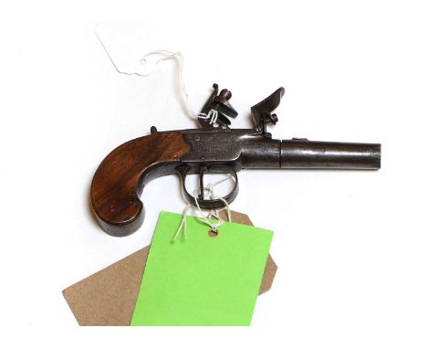 A flintlock pocket pistol 19th century by Pontonthe brass frame with walnut grip6cm barrelProvenance : from the estate of a c