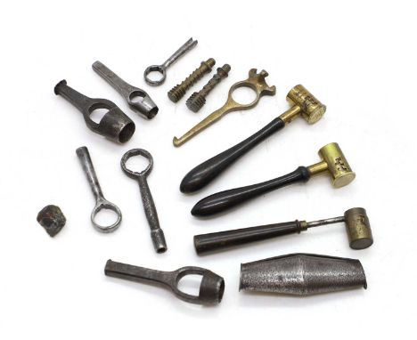 A flintlock loading flask  together with a collection of steel shot measures and barrel wrenches, longest 13.5cm longShipping
