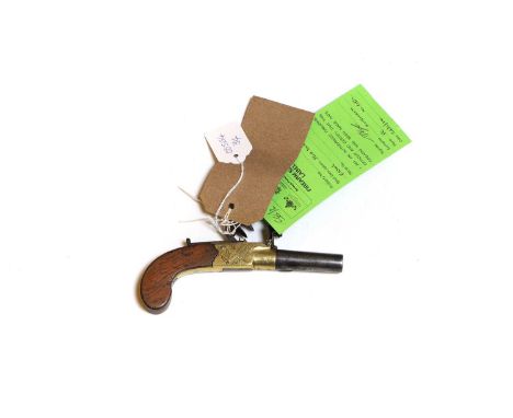 A flintlock pocket pistol early 19th century, by Smith, London, with brass frame and walnut grip,5cm barrelProvenance : from 