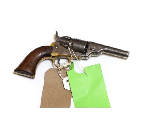 A Colt Model 1849 pocket revolver  Serial number 27144 IP, .31 caliber  the octagonal barrel with brass trigger guard and gri