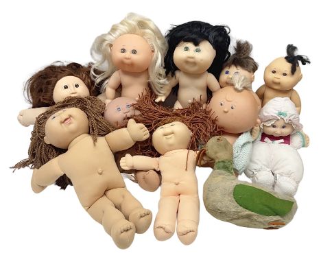 Plush covered soft toy of a swimming duck with squeeze type musical action L17cm; and collection of ten Cabbage Patch type do