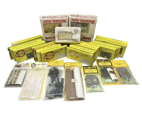 '00' gauge trackside accessories - twenty-six Ratio Plastic Model kits of passenger coaches, wagons, signals, water tower, si