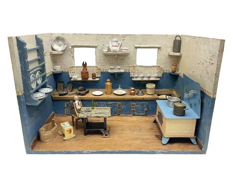 Late Victorian German white and blue painted pine diorama of a kitchen interior, the long work surface with inset wash bowl a