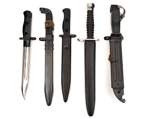 4 various current issue bayonets,  in scabbards, and another without scabbard. VGC (5)          