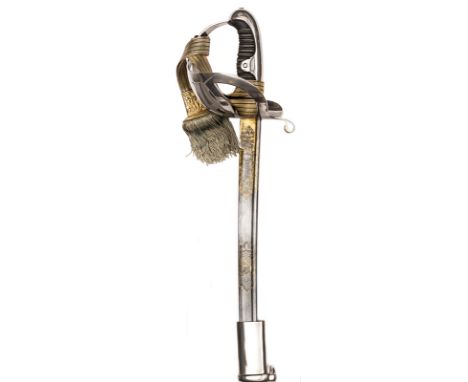 †A Prussian 1856 pattern Hussar officer’s sword,  curved, pipe backed blade 32½”, double edged at point, and etched at forte 