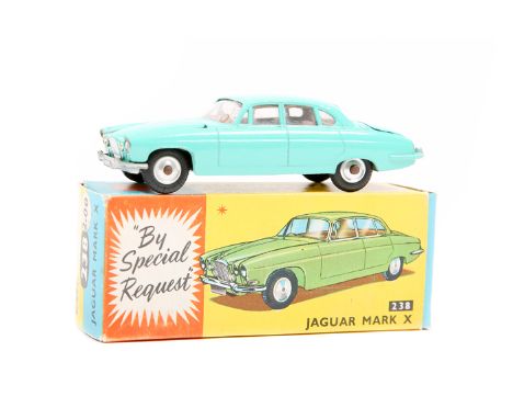 Corgi Toys Jaguar Mark X (238). A scarce example in sea green with red interior. Boxed, minor wear/damage to one end flap. Ve