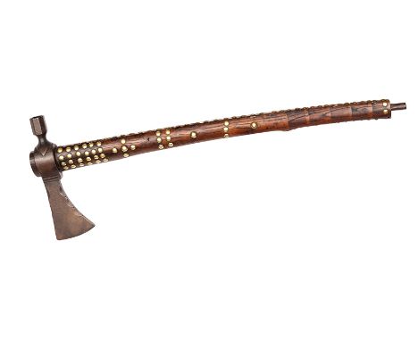 A 19th century American Indian tomahawk pipe, iron trade blade 2½”, scalloped along the upper and lower edges, plain socket a
