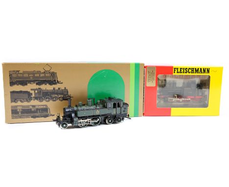 2 HO Gauge steam locomotives. A Trix HO class DX11 2-4-4 tank locomotive 2230 (2430) in lined dark green and black livery. Pl
