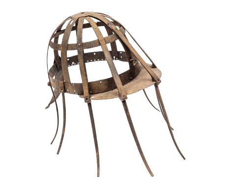 A rare 17th century “Spider” helmet, the crown formed from 10 radiating bars secured by 2 bands and with a peak at the front,
