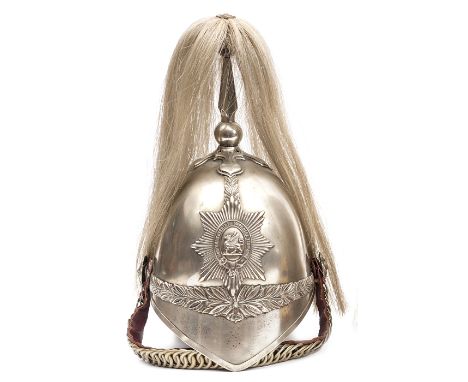 A trooper’s white metal helmet, c 1905, of the Montgomeryshire Imperial Yeomanry, white metal mounts including ear to ear wre
