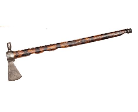 A 19th century American Indian tomahawk pipe,  iron trade blade 2½”, with panelled socket and peen which forms the pipe bowl,