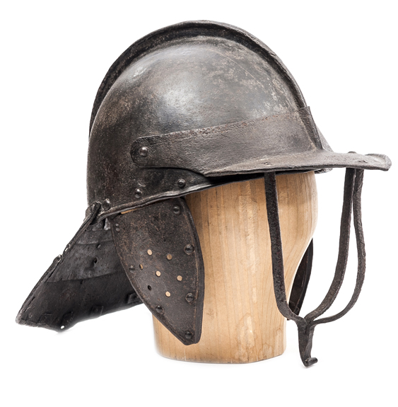 A Cromwellian triple bar “lobster tail” helmet, the skull in two halves ...