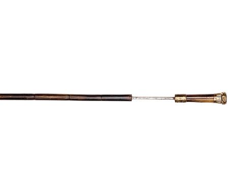 A Victorian swordstick, squared blade 27” tapering to a single. Horn grip with gilt mounts, bamboo sheath with brass ferrule,