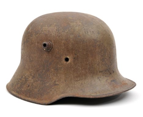 The skull  only of a German M16 steel helmet. Basically sound condition (slightly rusted overall, small crack)               