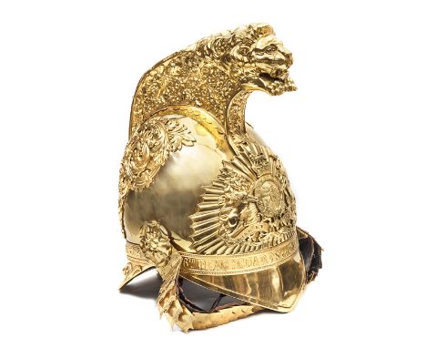 †An officer’s gilt helmet of The 6th Dragoon Guards (Carabiniers) 1834-1843 pattern,  plain front peak, stylized shell orname