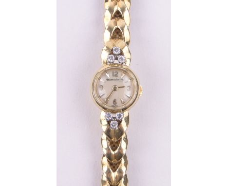 A lady's Jaeger LeCoultre 18ct gold cased cocktail wristwatch,with articulated 18ct gold bracelet set with 6 diamonds, case w