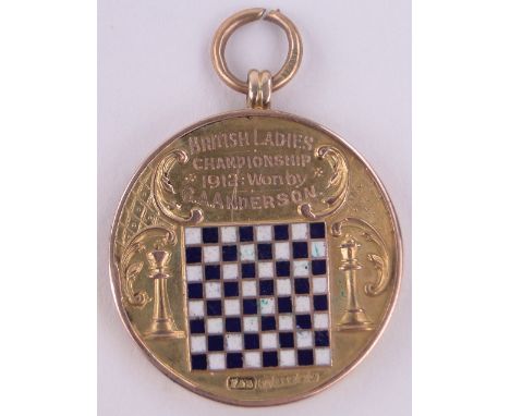 A 15ct gold and enamel medal "British Chess Federation",dated 1912, won by G Anderson, 21g, diameter 1.25".