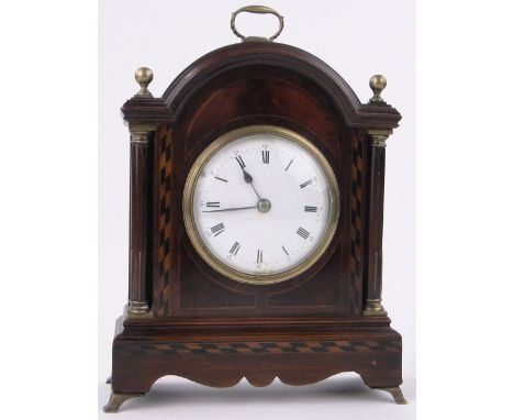 An Edwardian mahogany cased domed top mantel clock,with parquetry inlay and brass mounts, height excluding handle 10.5".
