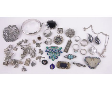 A quantity of silver jewellery,Chinese jade set brooch, charm bracelet, etc.