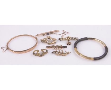 6 Various Antique gold brooches,a 9ct gold hinged bangle and an engraved Eastern bangle with bamboo mounts marked 20, gross w
