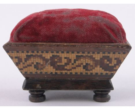 A Victorian Tunbridge Ware and rosewood pin cushion,with scroll parquetry inlaid frieze, length 2.5".