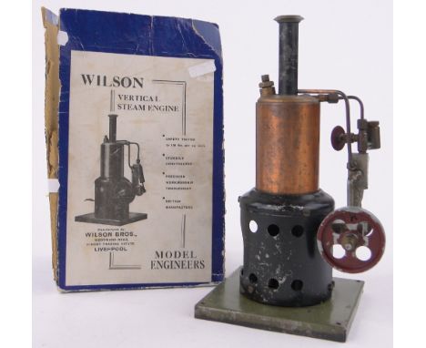 A Wilson vertical steam engine,height 9.5", original box.
