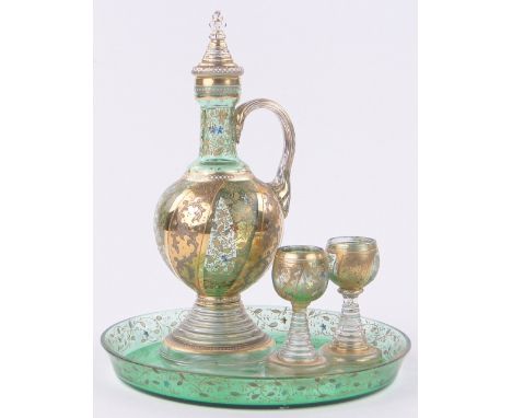 A Venetian painted and gilded green glass decanter with 2 small glasses and matching tray,decanter height 10", (4).