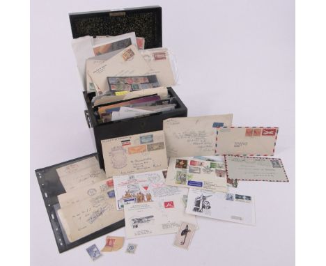 An envelope sent by the first flight of the Hindenburg 1936,together with various postcards and covers, etc.