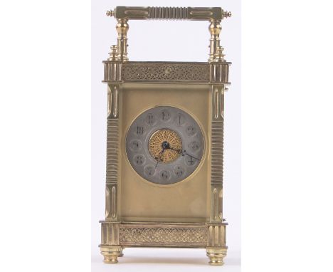 A good quality French brass cased carriage clock circa 1900,the case decorated with fretwork friezes, fluted square corner co