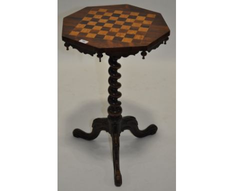 A 19th century rosewood games top occasional table on a spiral turned column and tripod legs, width 1'7", height 2'5".