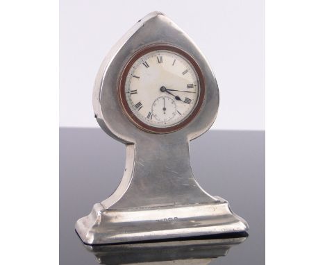 A silver fronted spade shaped desk clock,Birmingham 1921, height 11.5 cm.