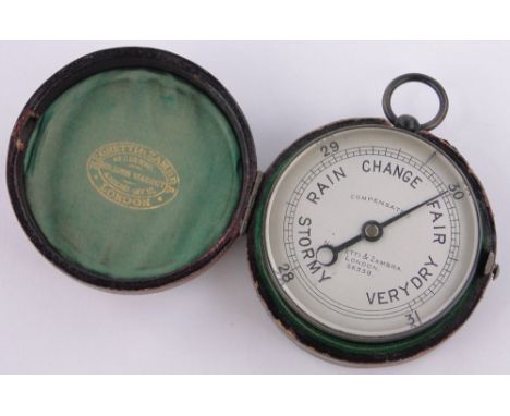 A Victorian Negretti & Zambra travelling barometer,patinated brass case with silvered dial, diameter 2.75" in original leathe