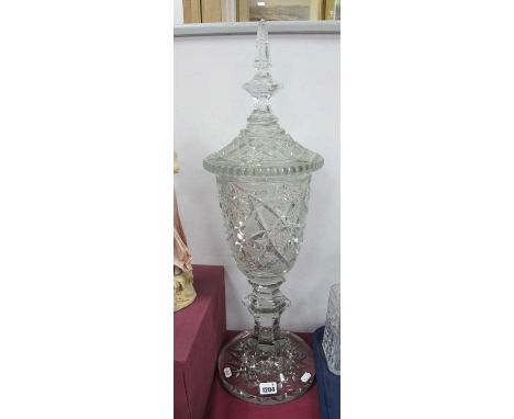 Heavy Glass Pedestal Vase and Cover, with hexagonal baulster and finial, circular base, star and slice cut, approximately 63c