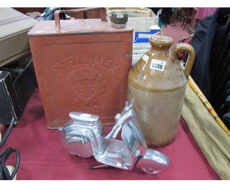 A 'Shell-Mex BP Ltd' Petrol Can, 32cm high, E. Holmes, Sheffield flagon and a chrome model of a scooter. (3)