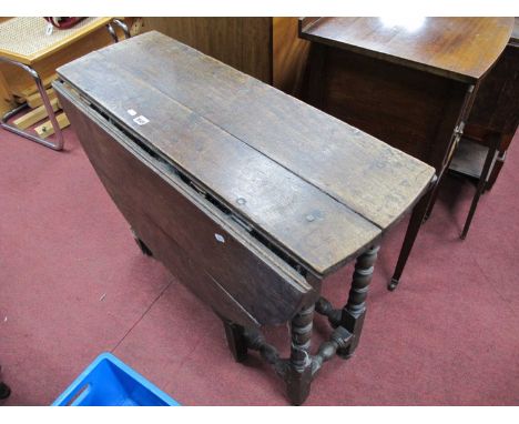 Georgian Period Oak Oval ToppedGateleg Table, with bobbin supports, twin drawers, 66cm high.