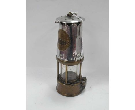 Miners Lamp by Protector Lamp &amp; Lighting Co, brass lower body, 24cm high with handle down.