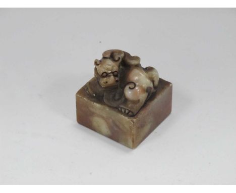 Oriental, Chinese soapstone seal 3.7cm square, with temple lion atop, 4cn high.