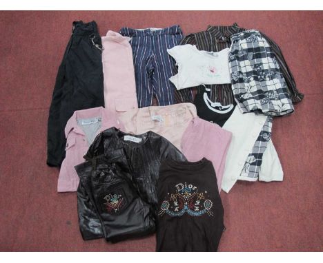 A Collection of Modern Christian Dior Children's Outfits:- a brown leather trouser suit and matching t-shirt (age 5), a pink 