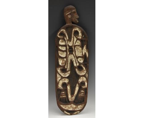 Tribal Art - an Oceanic panel, probably a Huon Gulf gope board, carved in relief with a stylised depiction of an ancestor, pi