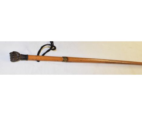 A 19th century malacca gentleman's walking stick, the pommel as a clenched fist, 85.5cm long Condition Report: The stick does