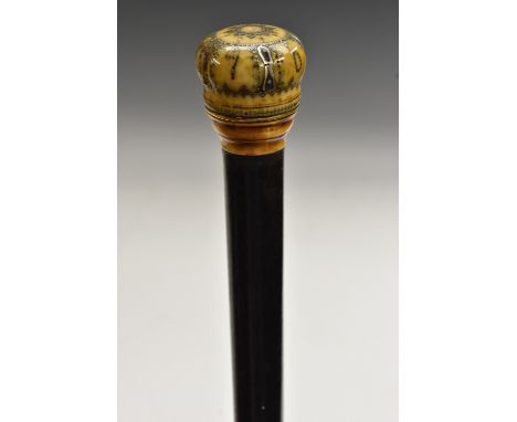 A Queen Anne ivory and silver pique walking stick handle, typically inlaid with pins and dated 1704, ebonised shaft, 88cm lon