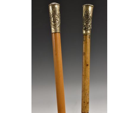 A World War I silver coloured metal mounted swagger stick, The Royal Fusileers, bamboo shaft, 70cm long; another, Elizabeth I